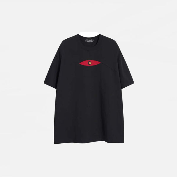 Front view of the black Patchwork Embroidered Eye T-Shirt in a gray background