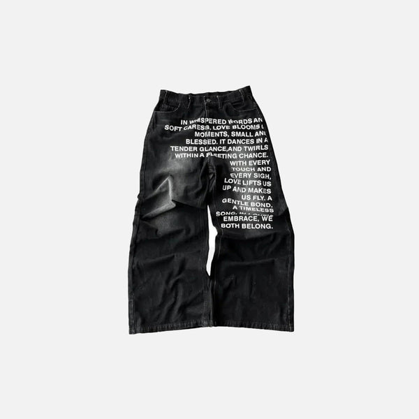 Front view of the black Whispered Denim Elegance Jeans in a gray background