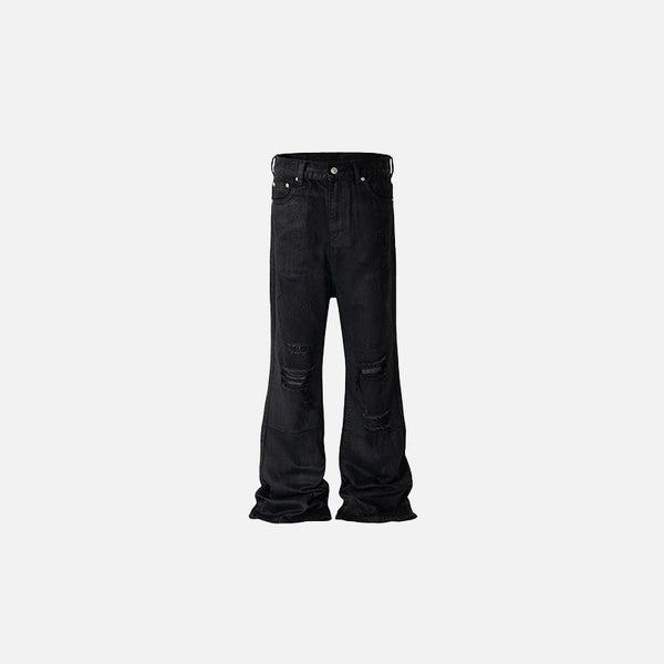 Front view of the black Distressed Baggy Black Jeans in a gray background