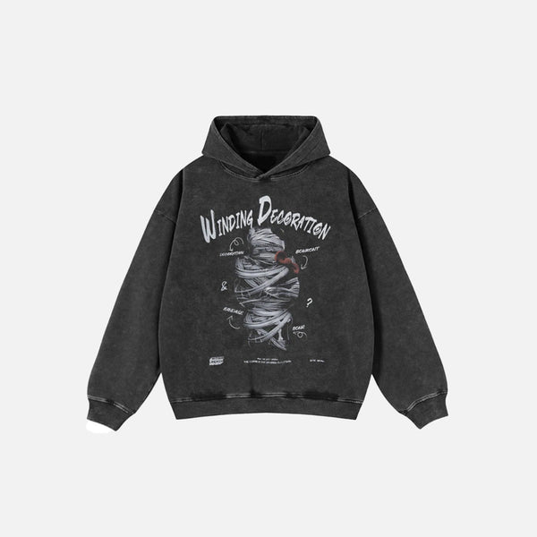 Front view of the black Winding Decoration Wrapped Hoodie in a gray background