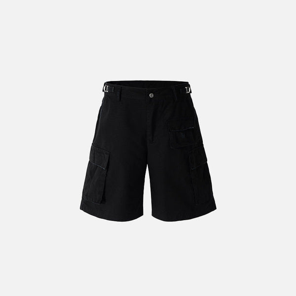 Front view of the black Hand-polished Belt Black Jorts in a gray background