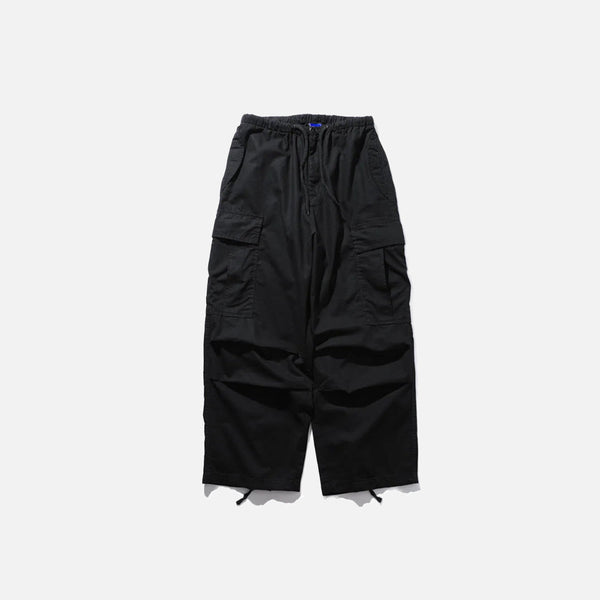 Front view of the black Adventure-Ready Cargo Pants in a gray background