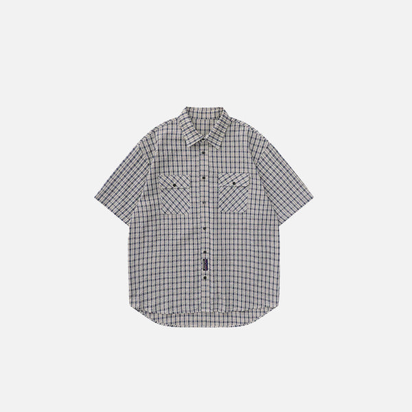 Front view of the black Plaid Reversible short Sleeve Shirt in a gray background
