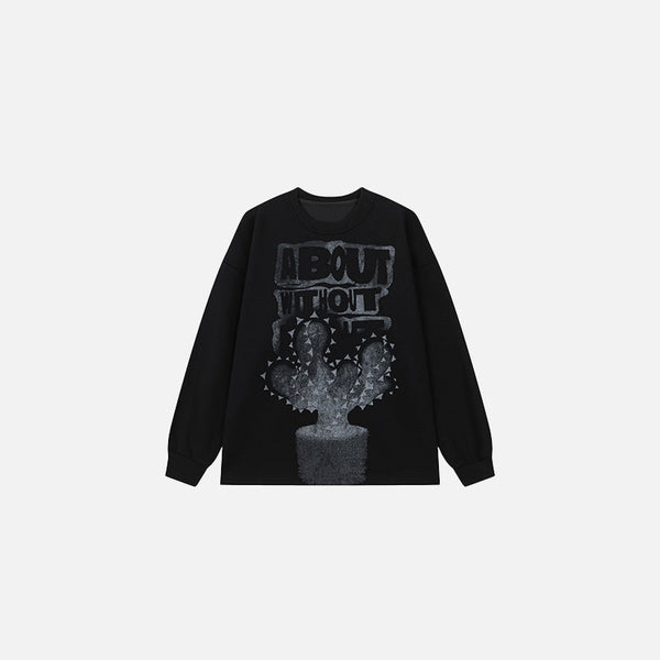 Front view of the black Urban Spikes Long Sleeve T-shirt in a gray background