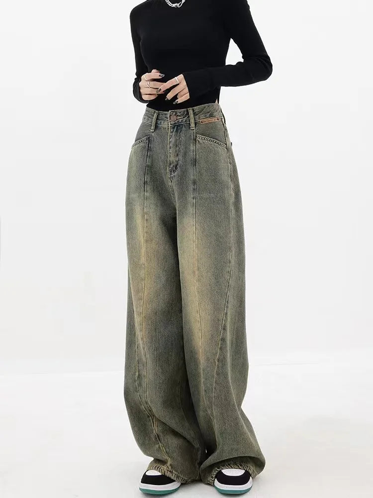Model wearing the blue Vintage Washed Wide-Leg Crop Jeans