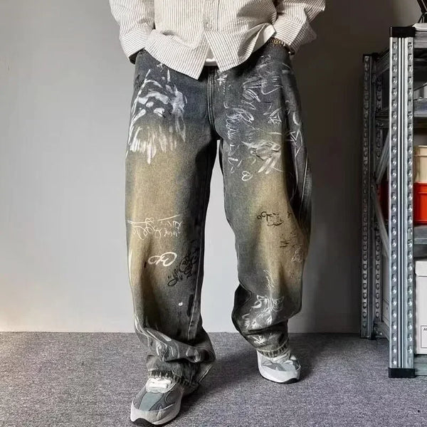 Model wearing the blue Graffiti Fade Baggy Jeans