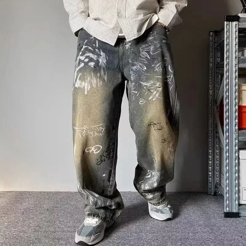 Model wearing the blue Graffiti Fade Baggy Jeans