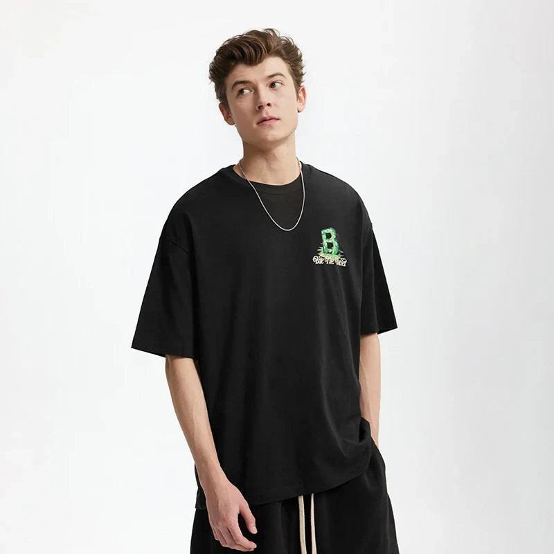Model wearing the black Grizzly B Graphic T-Shirt