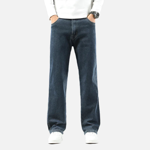 Model wearing the gray blue Classic Denim Jeans