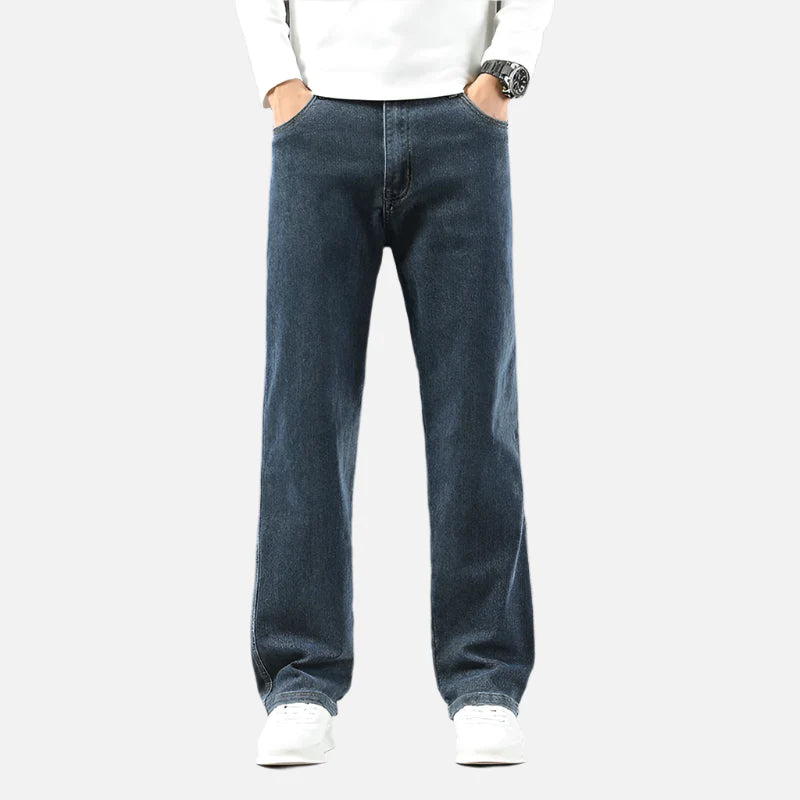 Model wearing the gray blue Classic Denim Jeans