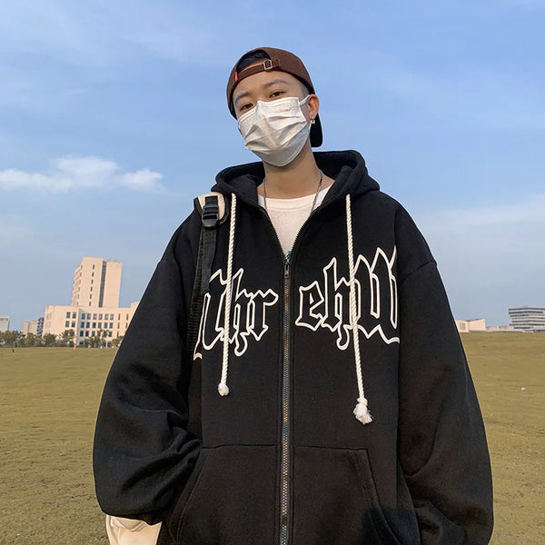 Model wearing the black Gothic Arch Hoodie