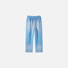 Front view of the sky blue Casual Noir Relax Pants in a gray background