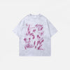 Front view of the white Graphic Printed Grunge T-Shirt in a gray background