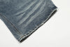 Yıkanmış Yırtık Detaylı İspanyol Paça Jean Pantolon, yakın çekim — Navra Wear
