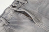 Yıkanmış Yırtık Detaylı İspanyol Paça Jean Pantolon, model üzerinde — Navra Wear