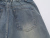Yıkanmış Yırtık Detaylı İspanyol Paça Jean Pantolon, model üzerinde — Navra Wear