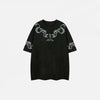 Front view of the black Vintage Oversized Embroidered T-Shirt in a gray background