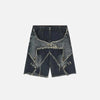 Front view of the dark blue Vintage Starry Fringe Jorts in a gray background