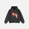 Front view of the black Y2K Blaze Streak Hoodie  in a gray background