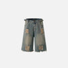 Front view of the blue Washed Distressed Jorts in a gray background 