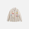 Front view of the khaki Garden Stroll Shirt in a gray background