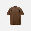 Front view of the brown Embroidery Patchwork T-shirt in a gray background
