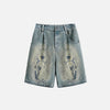 Front view of the blue Divine Print Denim Shorts in a gray background