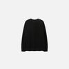 Front view of the black Classic Crewneck Sweater in a gray background