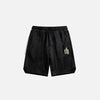 Front view of the black Vintage Cozy Sports Shorts in a gray background