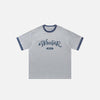Front view of the gray white Loose Letter Print Oversized T-shirt in a gray background 