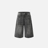Front view of the black Y2k Solid Washed Jorts in a gray background 