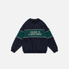 Front view of the navy blue Loose Embroidered Patchwork Sweatshirt in a gray background