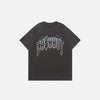 Front view of the black Vintage Loose Washed Printed T-Shirt in a gray background 