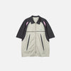 Front view of the green Splicing Color Zip-up Shirt in a gray background 