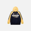 Front view of the blue Retro Athletic Dreamer Hoodie in a gray background