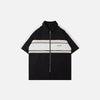 Front view of the black Sports Loose Polo Zip-up Shirt in a gray background 