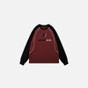 Front view of the red Endgame Script Sweatshirt in a gray background