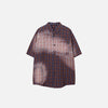 Front view of the red Plaid Polo Loose Shirt in a gray background
