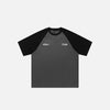 Front view of the gray Raglan Sleeve Contrast Color T-shirt in a gray background 