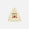 Front view of the apricot Cheerful Fruit Hoodie in a gray background