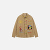 Front view of the khaki Cosmic Play Shirt in a gray background