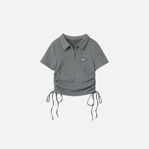 Front view of the grey Women's Polo With Side Ties T-shirt  in a gray background 