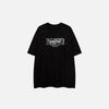 Front view of the black Fantasy Glitter Loose T-shirt in a gray background 