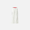 Front view of the white Classic Relaxed Fit Pants in a gray background