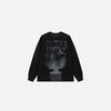 Front view of the black Urban Spikes Long Sleeve T-shirt in a gray background
