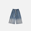 Front view of the blue Relaxed Fit Denim Bermuda Jorts in a gray background