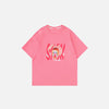 Front view of the pink Artistic Face Print Oversized T-shirt in a gray background