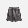 Front view of the grey Vintage Cozy Sports Shorts in a gray background