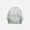 Front view of the green Loose  Embroidered Sweatshirt in a gray background