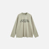 Front view of the green Motivational Long-Sleeve T-shirt in a gray background